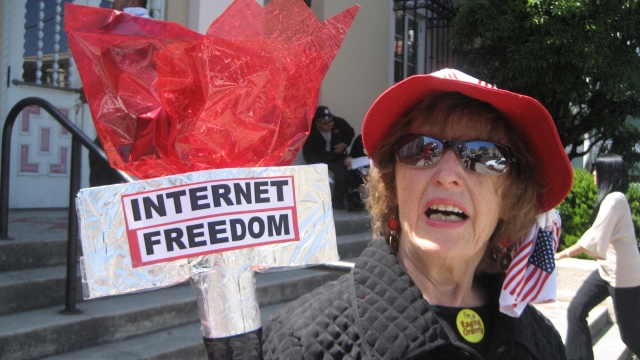 granny holding internet freedom torch